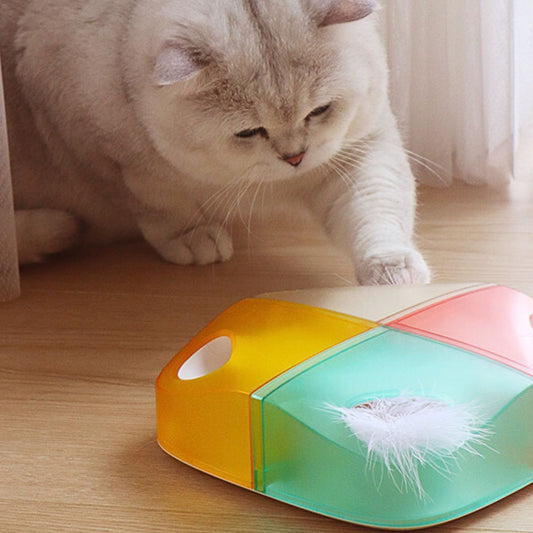 Slimme Kattenveer Speelgoed Witte doos uitstralend warm geel oranje en rood licht