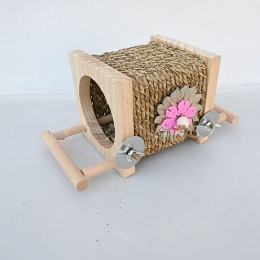vogelkooi kauw tunnel met natuurlijk riet en bloemendecor